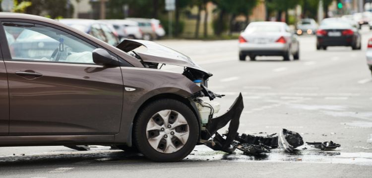 Wrecked car in the middle of the road